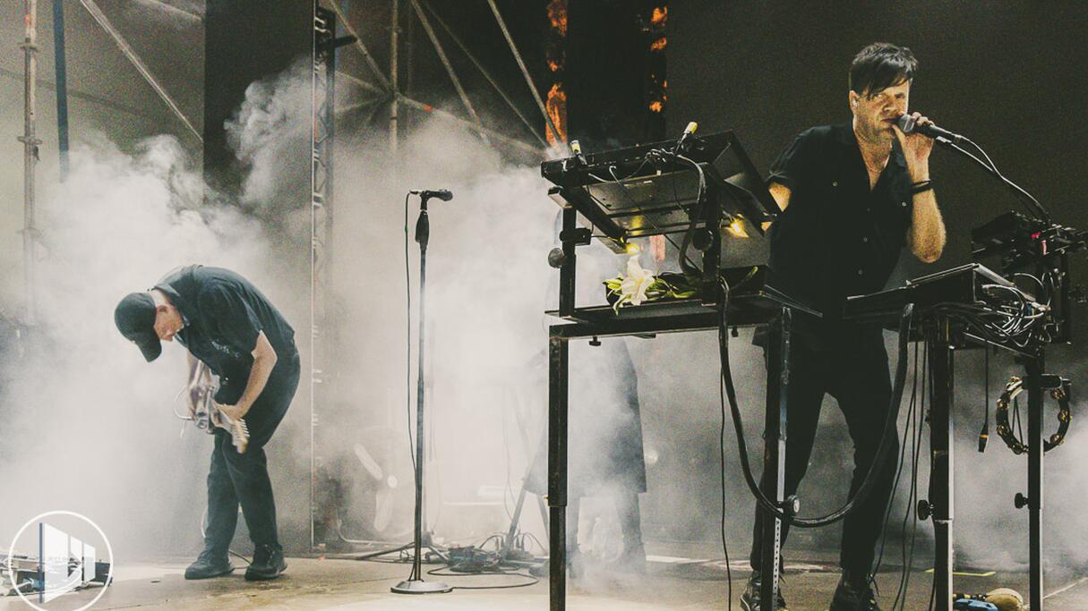 Trentemøller on stage behind his synths and Brian Batz on guitar