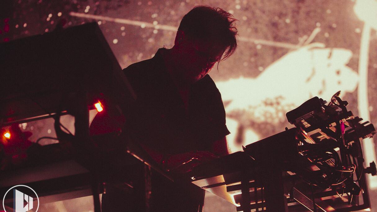 Trentemøller on stage behind his synths
