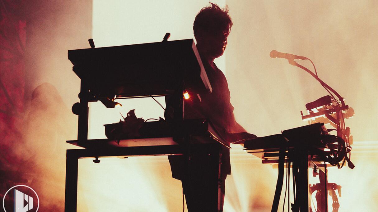 Trentemøller on stage behind his synths